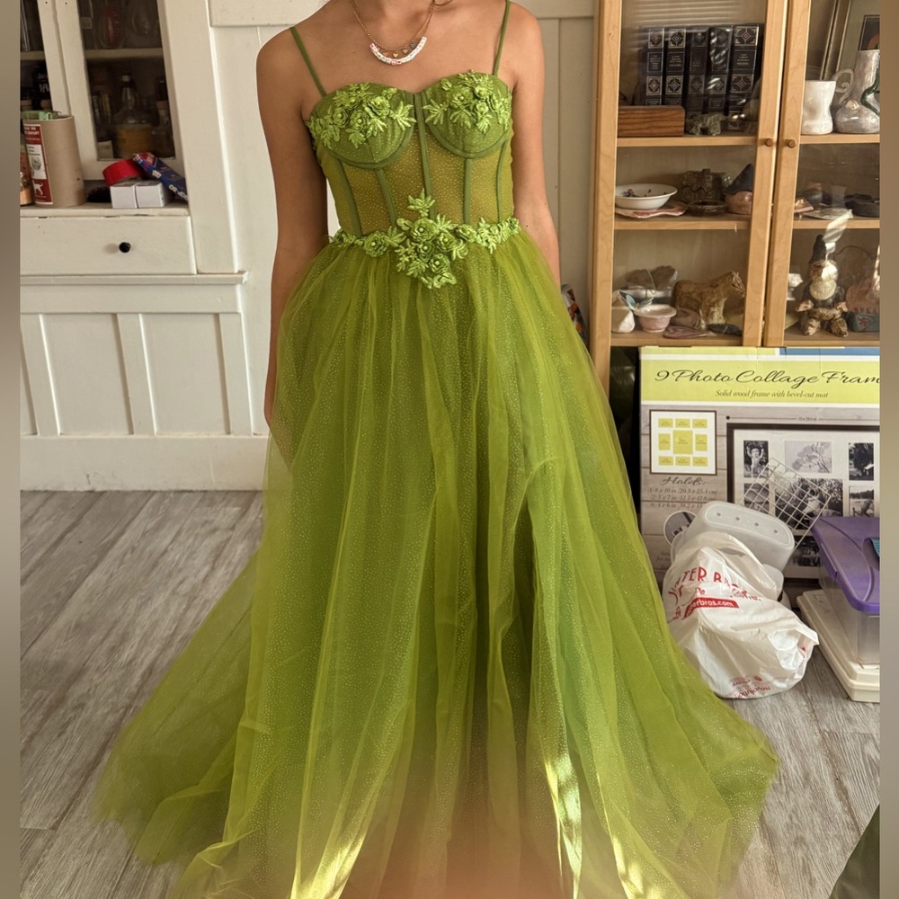 Green formal full length dress.